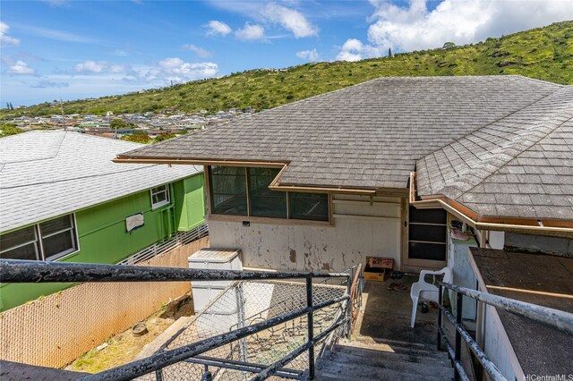 1968 10th Ave, Honolulu, HI 96816 - view of front of home featuring roof with shingles