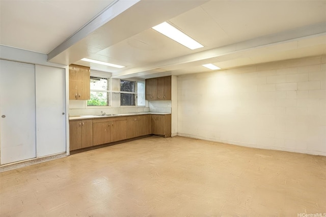 1968 10th Ave, Honolulu, HI 96816 - kitchen with brown cabinets, light countertops, light flooring, and a sink