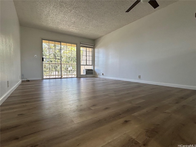 941449 Waipio Uka St Unit K204, Waipahu, HI 96797 - unfurnished room with dark wood-style floors, ceiling fan, a textured ceiling, and baseboards