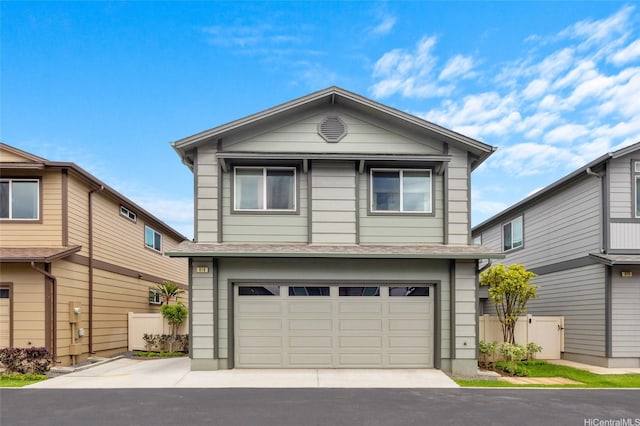 91-1159 Kamakana St Unit 818, Ewa Beach, HI 96706 - traditional-style house featuring a garage, driveway, and roof with shingles