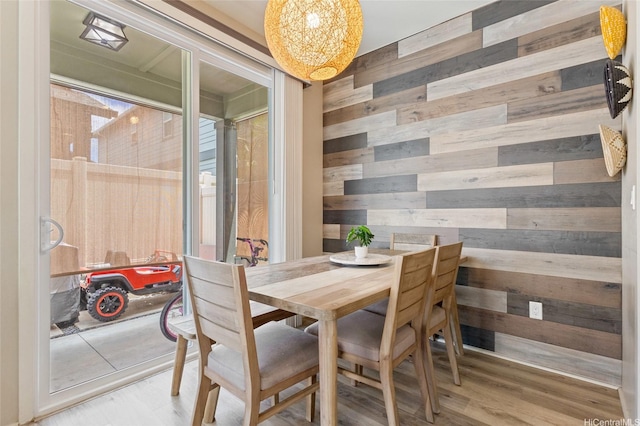 91-1159 Kamakana St Unit 818, Ewa Beach, HI 96706 - dining area with wooden walls, a chandelier, and wood finished floors