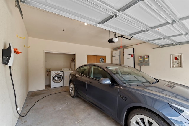 44-279 Kaneohe Bay Dr Unit B, Kaneohe, HI 96744 - garage featuring washer and dryer, a garage door opener, and water heater