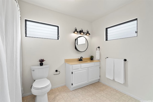 44-279 Kaneohe Bay Dr Unit B, Kaneohe, HI 96744 - bathroom featuring vanity, toilet, baseboards, and tile patterned floors