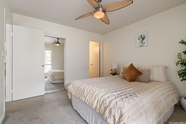 492 Mananai Pl Unit 13E, Honolulu, HI 96818 - bedroom featuring carpet flooring, a closet, and a ceiling fan