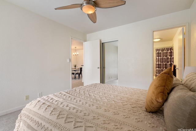 492 Mananai Pl Unit 13E, Honolulu, HI 96818 - bedroom featuring light carpet, baseboards, a chandelier, ceiling fan, and a closet