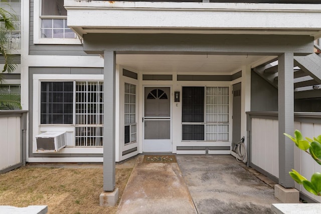 492 Mananai Pl Unit 13E, Honolulu, HI 96818 - view of exterior entry with cooling unit