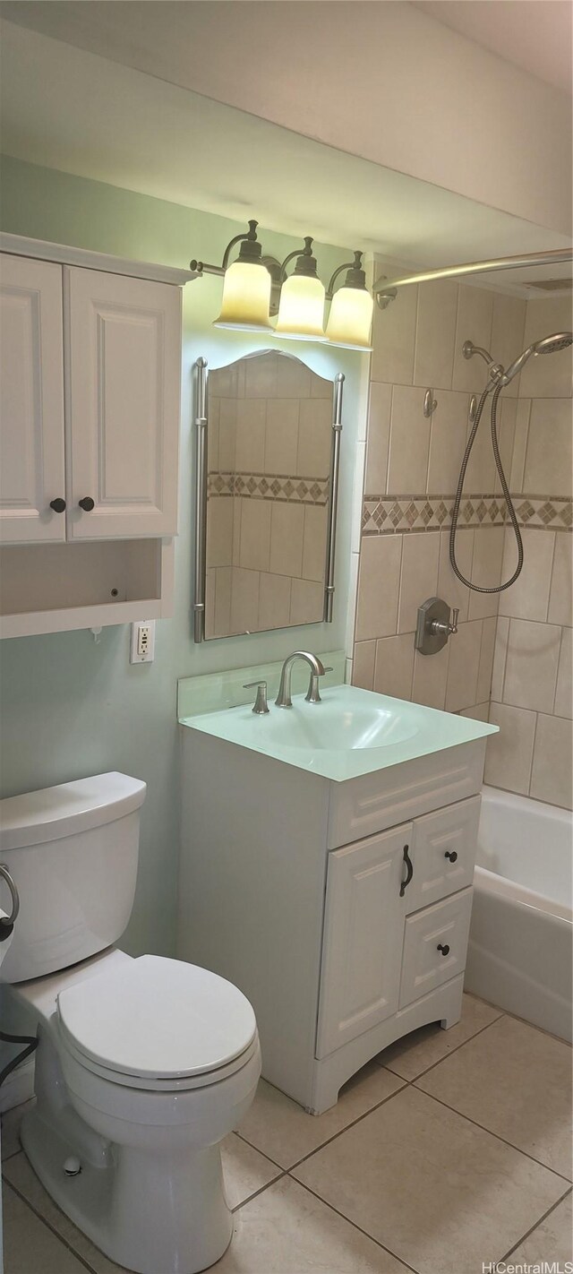 1402 Piikoi St Unit 502, Honolulu, HI 96822 - bathroom with vanity, toilet, tile patterned flooring, and bathing tub / shower combination