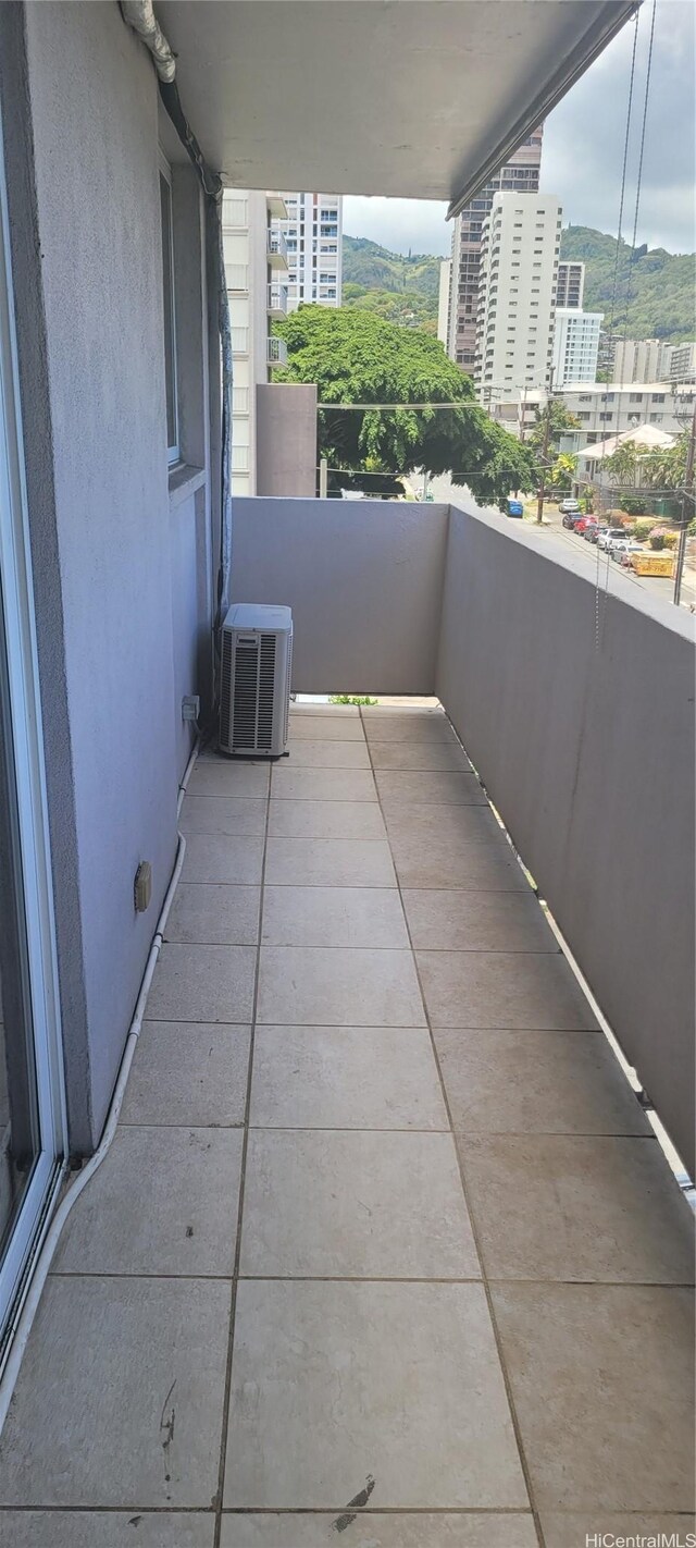 1402 Piikoi St Unit 502, Honolulu, HI 96822 - balcony with a view of city and cooling unit