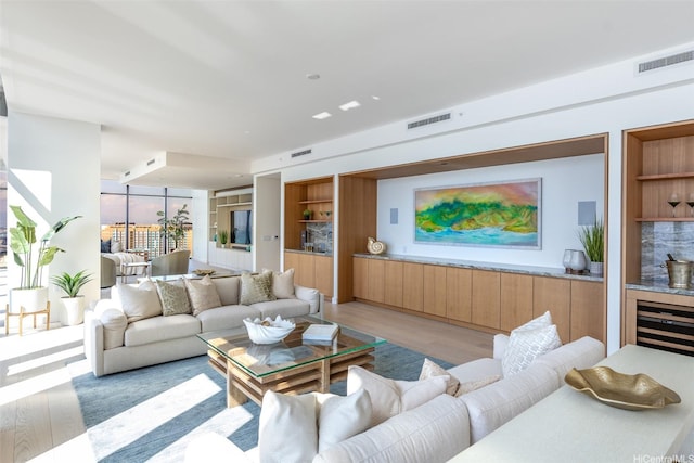 1100 Ala Moana Blvd Unit 4000/4001, Honolulu, HI 96814 - living room with light wood-style floors and beverage cooler