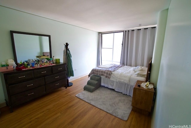 1296 Kapiolani Blvd Unit Ii3302, Honolulu, HI 96814 - bedroom with wood finished floors