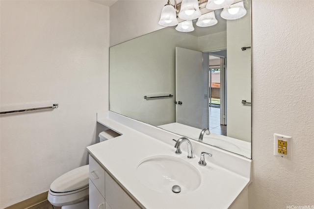 91-1199 Mikohu St Unit 39D, Ewa Beach, HI 96706 - bathroom featuring a chandelier, toilet, and vanity