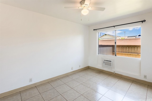 91-1199 Mikohu St Unit 39D, Ewa Beach, HI 96706 - unfurnished room with light tile patterned floors, ceiling fan, a wall mounted air conditioner, and baseboards