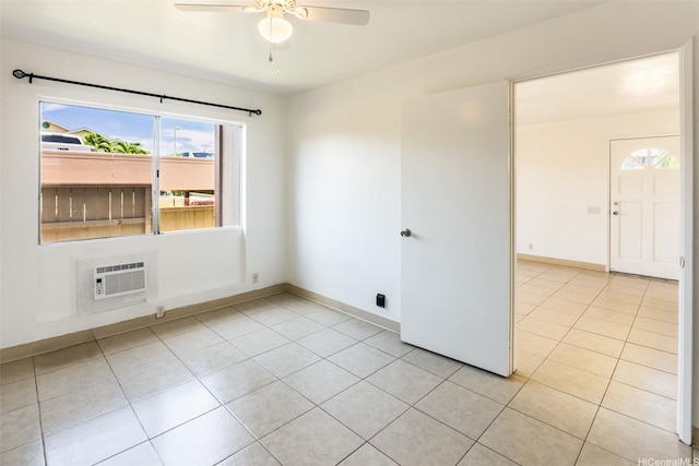 91-1199 Mikohu St Unit 39D, Ewa Beach, HI 96706 - unfurnished room with a wall unit AC, light tile patterned floors, ceiling fan, and baseboards