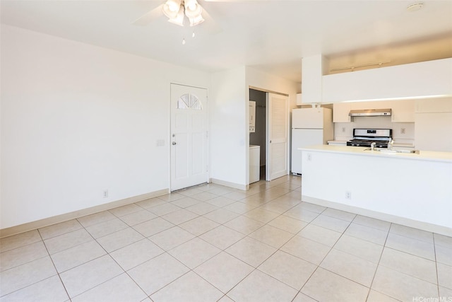 91-1199 Mikohu St Unit 39D, Ewa Beach, HI 96706 - unfurnished living room featuring a ceiling fan, light tile patterned flooring, and baseboards