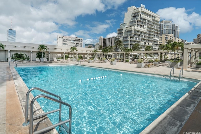 410 Atkinson Dr Unit 2418, Honolulu, HI 96814 - community pool with a patio