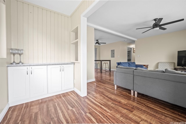 53-388 Kamehameha Hwy, Hauula, HI 96717 - living room with ceiling fan, light wood-type flooring, baseboards, and wooden walls