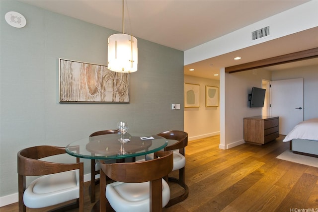 2139 Kuhio Ave Unit D2606, Honolulu, HI 96815 - dining space featuring wood finished floors, recessed lighting, and baseboards