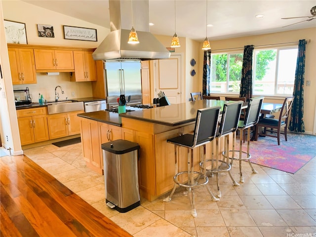 92-882 Wainohia St, Kapolei, HI 96707 - kitchen with island exhaust hood, appliances with stainless steel finishes, dark countertops, a kitchen island, and a breakfast bar