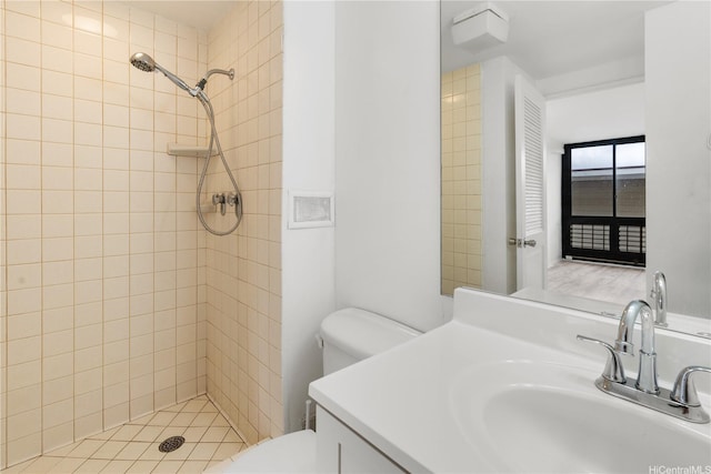 3071 Pualei Cir Unit 201, Honolulu, HI 96815 - bathroom featuring toilet, tiled shower, and vanity