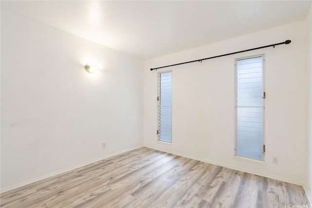 3071 Pualei Cir Unit 201, Honolulu, HI 96815 - spare room featuring light wood-style flooring and baseboards