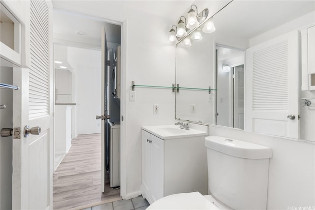 3071 Pualei Cir Unit 201, Honolulu, HI 96815 - bathroom with toilet, vanity, and tile patterned floors