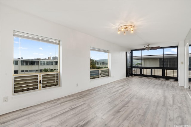 3071 Pualei Cir Unit 201, Honolulu, HI 96815 - spare room featuring wood finished floors and a ceiling fan