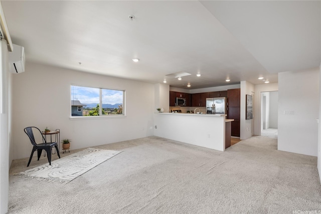 91-1081 Iwikuamoo St Unit 1202, Ewa Beach, HI 96706 - unfurnished living room featuring light carpet, recessed lighting, and a wall unit AC