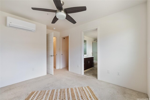 91-1081 Iwikuamoo St Unit 1202, Ewa Beach, HI 96706 - unfurnished bedroom with an AC wall unit, light colored carpet, connected bathroom, and a ceiling fan