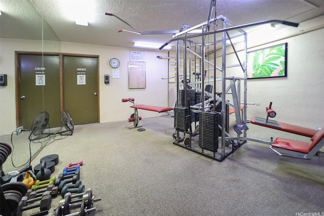 2740 Kuilei St Unit 2205, Honolulu, HI 96826 - exercise room with a textured ceiling