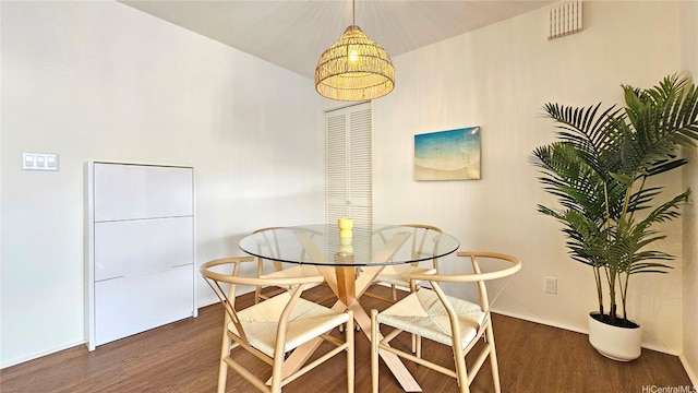 1910 Ala Moana Blvd Unit 32E, Honolulu, HI 96815 - dining area featuring wood finished floors and baseboards