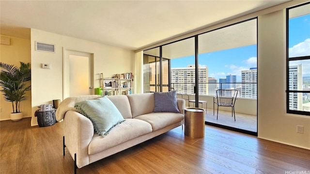 1910 Ala Moana Blvd Unit 32E, Honolulu, HI 96815 - living area featuring wood finished floors and a view of city