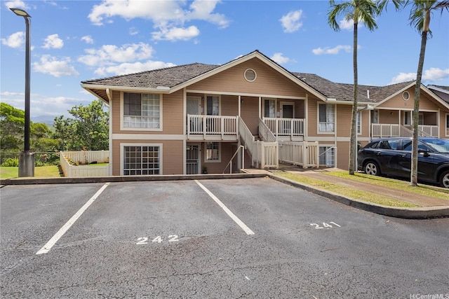94-100 Huki Pl Unit S106, Waipahu, HI 96797 - view of building exterior featuring uncovered parking