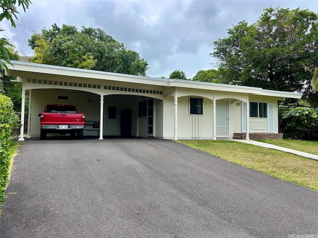 661 Iliaina St, Kailua, HI 96734 - ranch-style house featuring an attached carport, driveway, and a front lawn