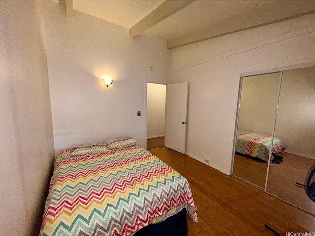 661 Iliaina St, Kailua, HI 96734 - bedroom featuring beamed ceiling, wood finished floors, and a closet