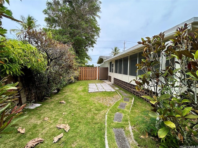 661 Iliaina St, Kailua, HI 96734 - view of yard featuring a sunroom and a patio