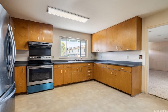 1425 Monte Cooke Pl, Honolulu, HI 96817 - kitchen with stainless steel appliances, under cabinet range hood, a sink, and dark countertops