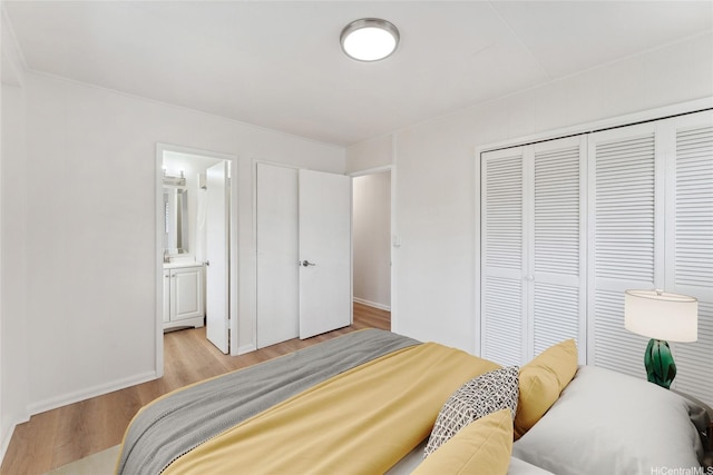 92-721 Anipeahi St, Kapolei, HI 96707 - bedroom with light wood finished floors, a closet, and ensuite bathroom