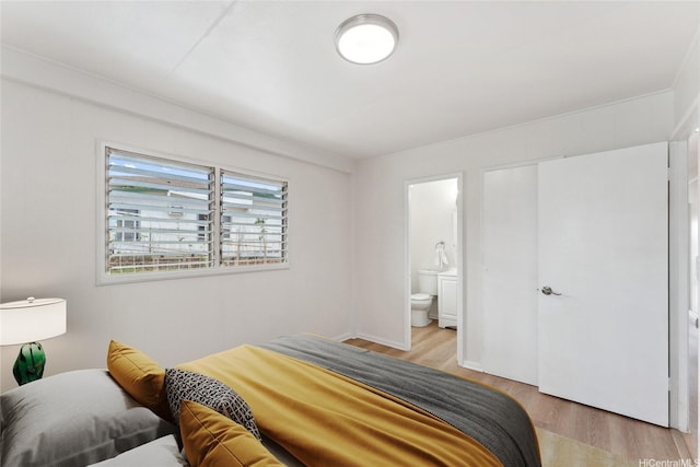 92-721 Anipeahi St, Kapolei, HI 96707 - bedroom with light wood finished floors and ensuite bathroom
