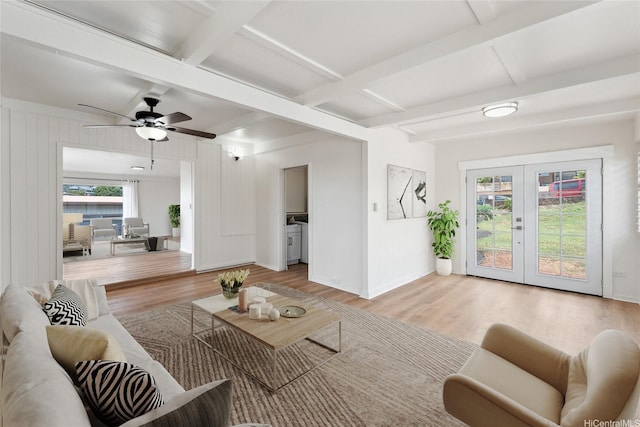 92-721 Anipeahi St, Kapolei, HI 96707 - living area with healthy amount of natural light, coffered ceiling, light wood-style floors, french doors, and beamed ceiling