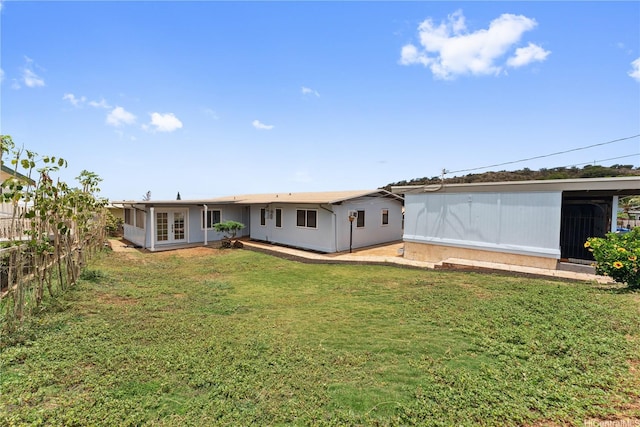92-721 Anipeahi St, Kapolei, HI 96707 - rear view of house featuring french doors