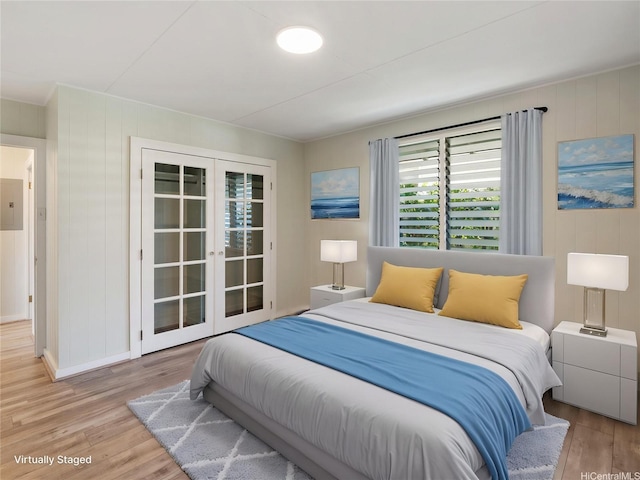 3622 Maunalei Ave, Honolulu, HI 96816 - bedroom with wood finished floors, french doors, electric panel, and baseboards