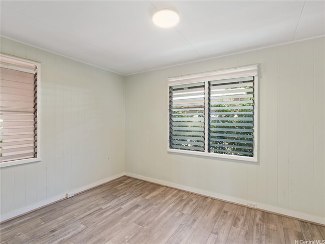 3622 Maunalei Ave, Honolulu, HI 96816 - empty room with wood finished floors, baseboards, and wooden walls