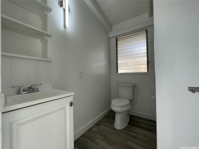 3622 Maunalei Ave, Honolulu, HI 96816 - bathroom with toilet, vanity, wood finished floors, and baseboards