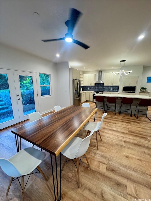 2318 Waiomao Rd Unit 4, Honolulu, HI 96816 - dining space featuring light wood-style floors and recessed lighting