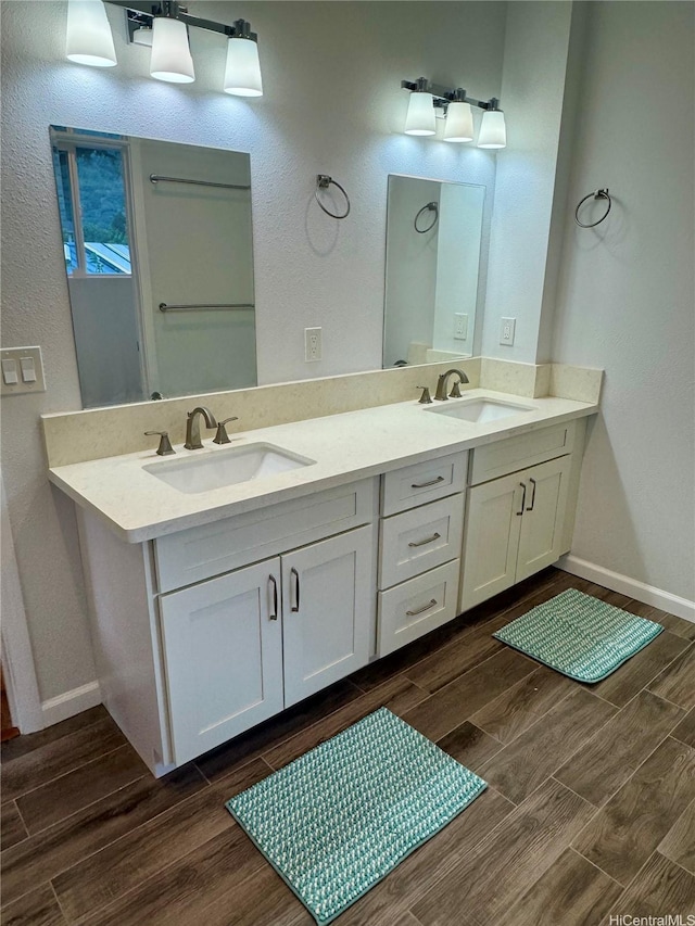 2318 Waiomao Rd Unit 4, Honolulu, HI 96816 - full bathroom featuring wood finished floors, double vanity, and baseboards