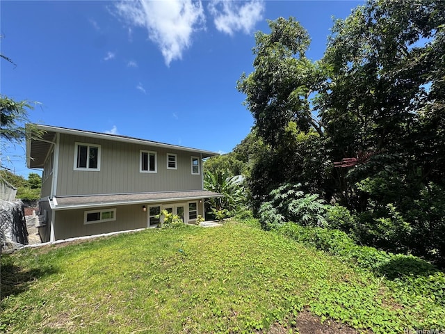 2318 Waiomao Rd Unit 4, Honolulu, HI 96816 - rear view of property with a yard