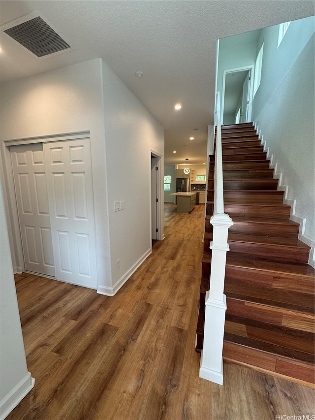 2318 Waiomao Rd Unit 4, Honolulu, HI 96816 - staircase with wood finished floors, baseboards, and recessed lighting