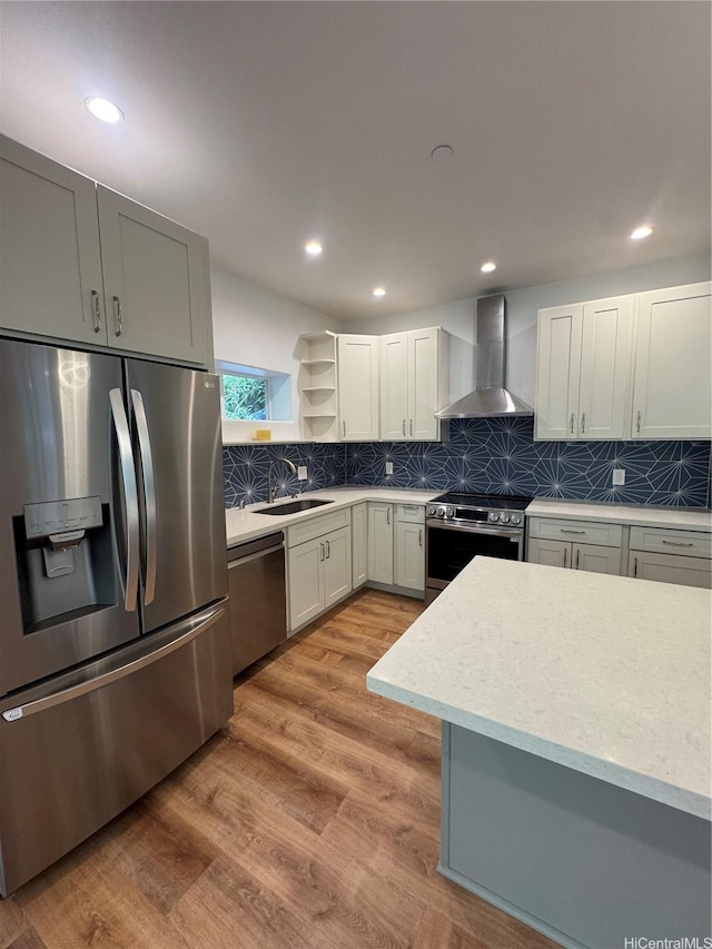 2318 Waiomao Rd Unit 4, Honolulu, HI 96816 - kitchen featuring appliances with stainless steel finishes, wall chimney exhaust hood, a sink, backsplash, and open shelves