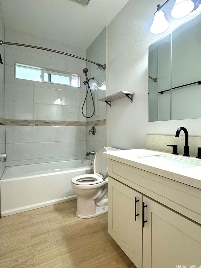 2318 Waiomao Rd Unit 4, Honolulu, HI 96816 - full bath featuring vanity, wood finished floors, shower / tub combination, and toilet
