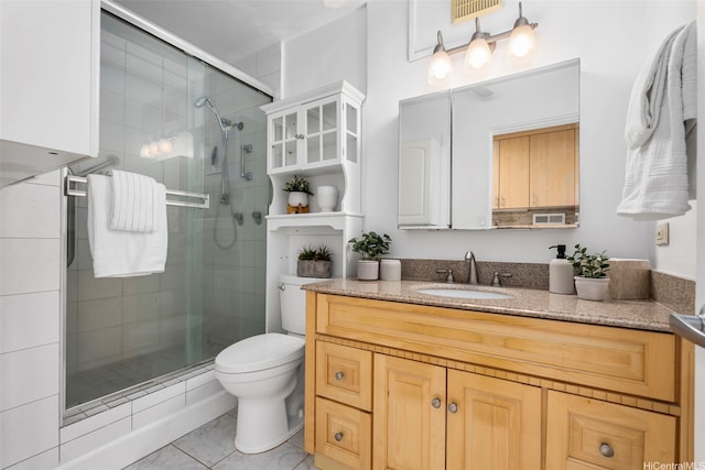 425 Ena Rd Unit Ph3B, Honolulu, HI 96815 - bathroom featuring vanity, toilet, and a stall shower